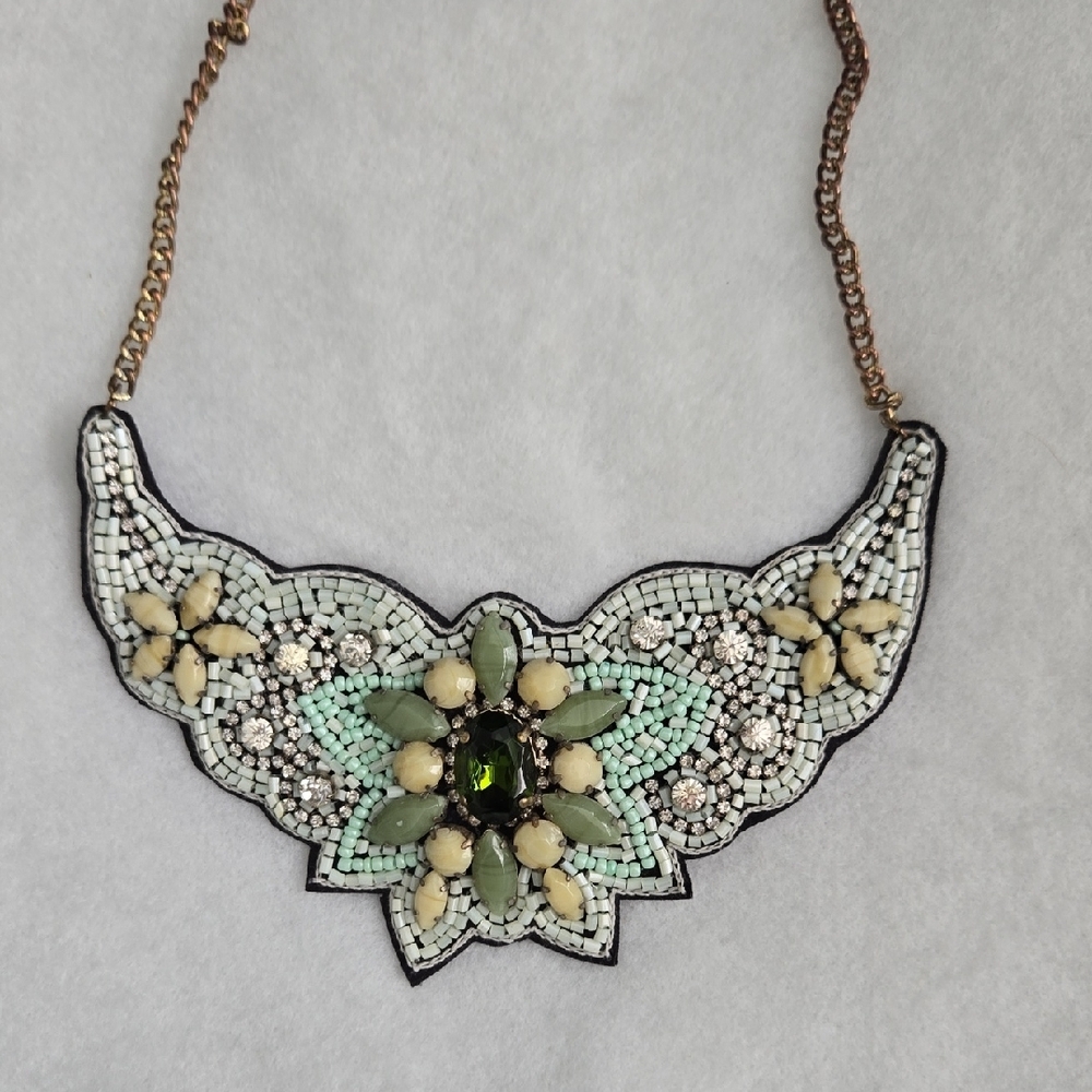 Elegant Beaded Necklace with Green and Cream Accents